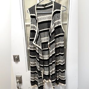 Sweater vest, black and white, open front no buttons or snaps
